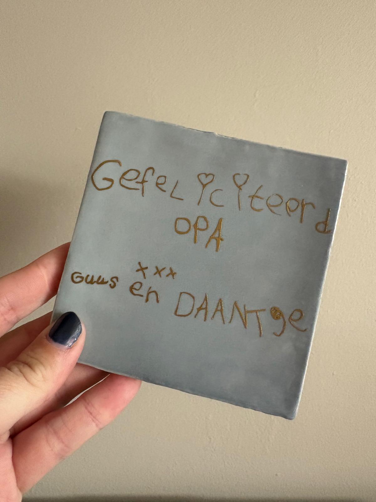 Tegeltje met handschrift